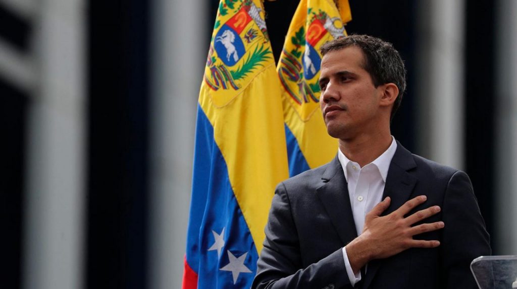 Opposition leader and self-appointed head of state Juan Guaidó was re-elected president of parliament by opposition members in a session outside the building in Caracas on Sunday.
