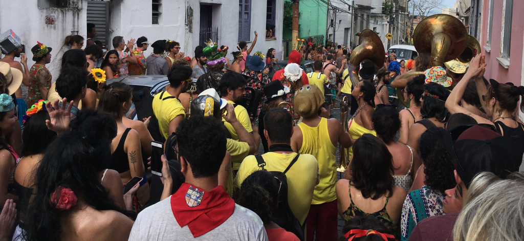 Members of the Bloco Mucho Practice at Bar da Jura. Photo - Colin Andrew.jpg (4032x3024, Scaled by 33%) The Mucho Bloco makes its way down the streets of Photo - Colin Andrew.jpg (4032x3024, Scaled by 33%) Cosme Felippsen explains the history of the Valongo Wharf. Photo - Colin Andrew.jpg (4032x3024, Scaled by 33%) Cosme Felippsen leading the up the stairs. Photo - Colin Andrew.jpg (4032x3024, Scaled by 33%) Cosme Felippsen shows off a few pieces from remarkable open air art gallery. Photo Colin Andrew.jpg (4032x3024, Scaled by 33%) A Mangueira float pays tribute to Quilombo dos Palmares. Photo - Rodrigo Gorosito - G1.jpg (2000x1333, Scaled by 66%) The Mucho carnival bloc ambles through the streets of the first favela. Photo - Colin Andrew.