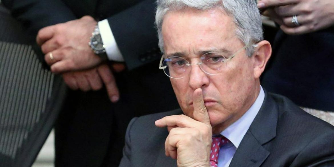 Former Colombian President Alvaro Uribe, who is under investigation for alleged witness tampering, resigned his Senate seat on Tuesday after being placed under house arrest earlier this month.