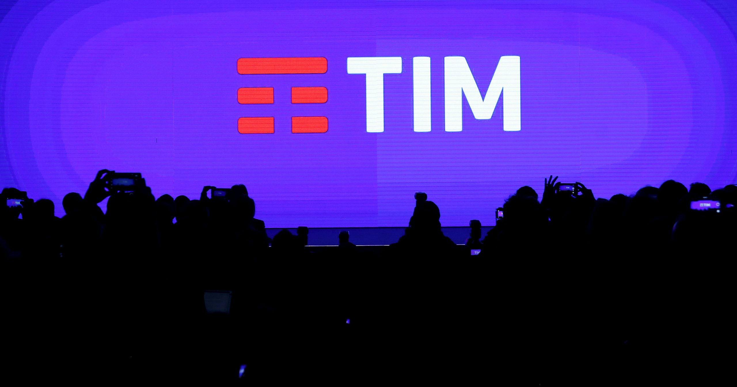 FILE PHOTO: Telecom Italia's new logo of its TIM brand seen on a screen during the launch in Rome