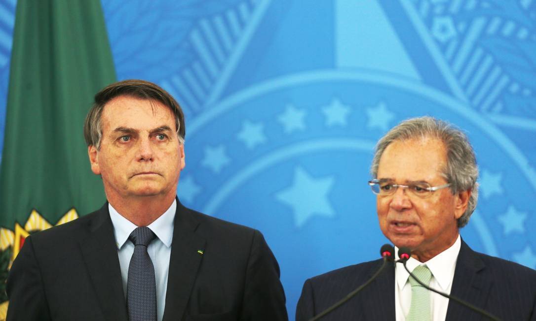 Brazilian President Jair Bolsonaro (left) and Brazilian Economy Minister Paulo Guedes (left).