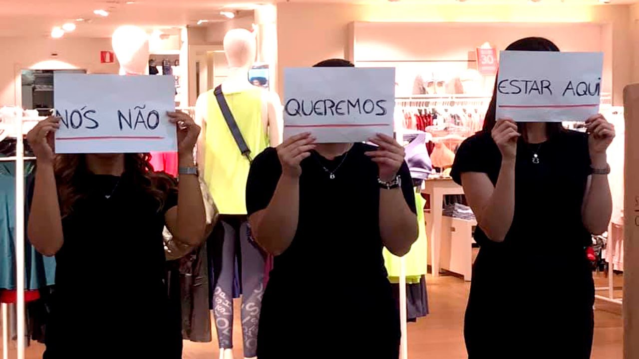 Three women holding a message that reads: "We do not want to be here".