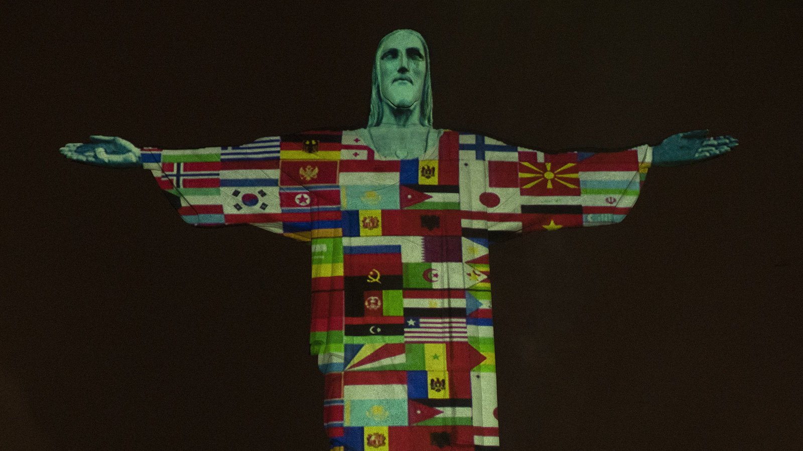 Brazil's Christ The Redeemer Lit Up With Flags Of Countries Battling Coronavirus