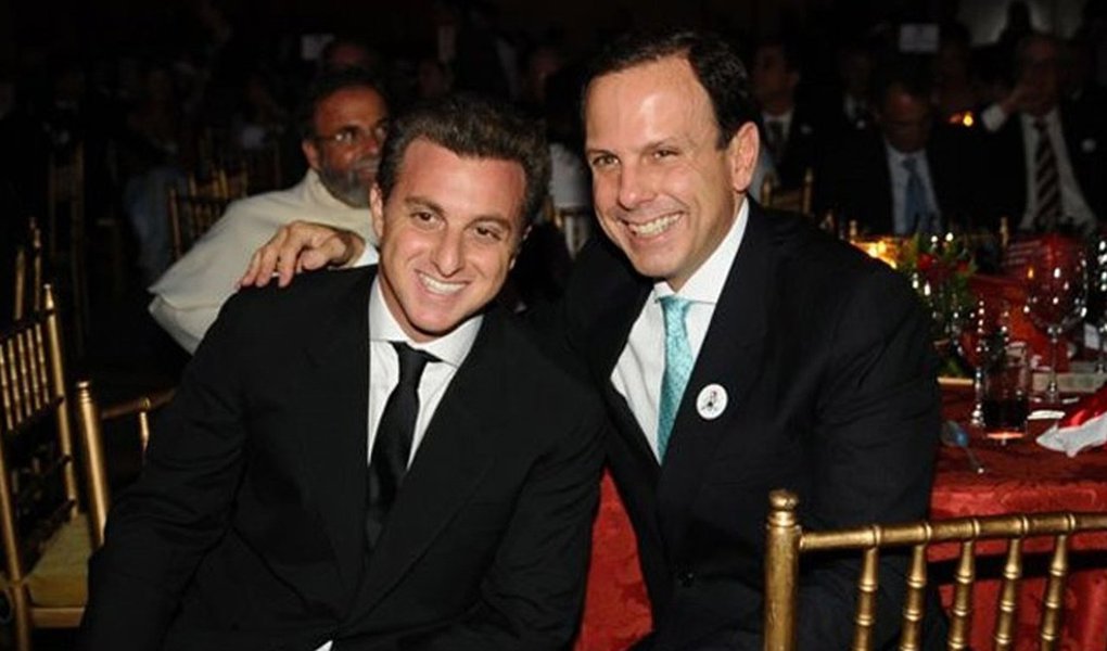 TV host Luciano Huck (left) and São Paulo State Governor João Doria (right).