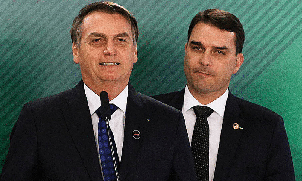 Brazilian President Jair Bolsonaro (left) and his son Senator Flávio Bolsonaro (right).