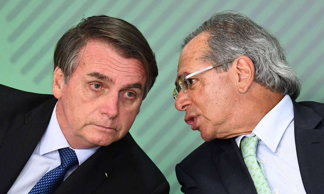 Brazilian President Jair Bolsonaro (left) and Brazilian Economy Minister Paulo Guedes (right).