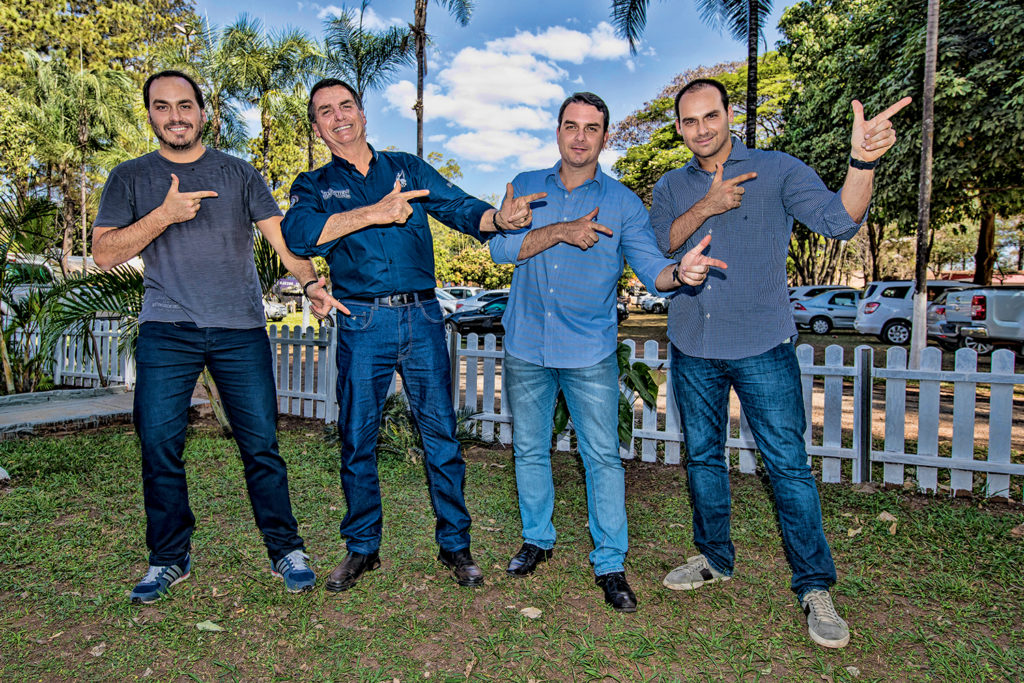 From left to right: Rio de Janeiro City Councilor Carlos Bolsonaro, Brazilian President Jair Bolsonaro, Senator Flávio Bolsonaro, and Federal Deputy Eduardo Bolsonaro.