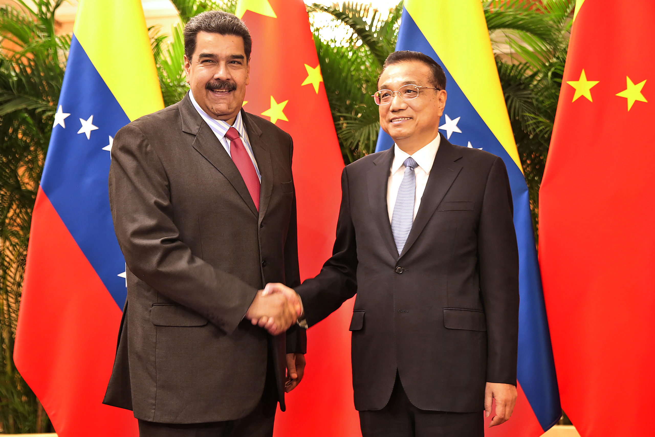 Venezuela’s government is encouraging private firms to sign import and export deals with companies in Asia and the Middle East as part of an effort to limit the impact of U.S. sanctions, according to four sources with knowledge of the matter.