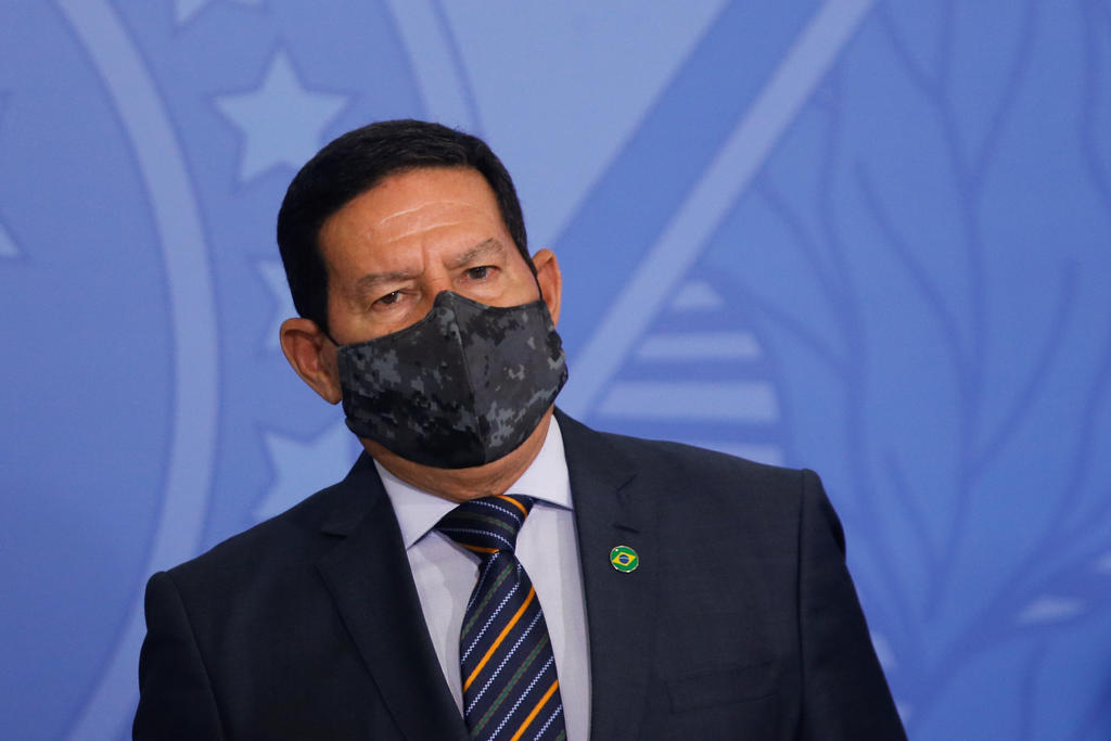 Brazil's Vice President Hamilton Mourao looks on during an inauguration ceremony of the new Health Minister in Brasilia