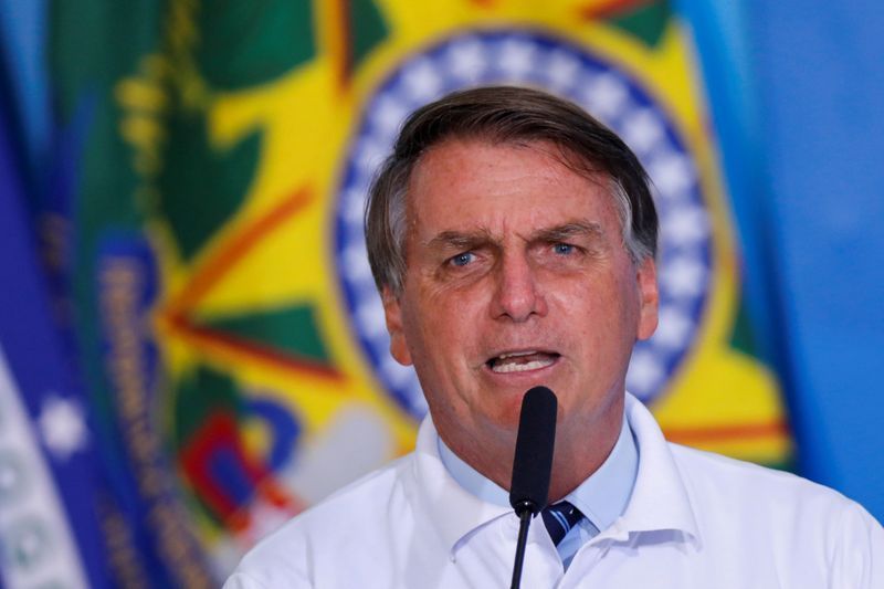 FILE PHOTO: Brazil's President Jair Bolsonaro speaks during a ceremony at the Planalto Palace