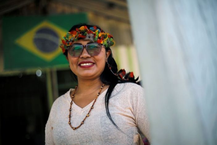Irisnaide Silva, 32, an Indigenous leader of one of two main indigenous groups in the Amazonian state of Roraima, smiles in the Raposa Serra do Sol reservation