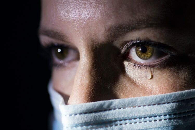 Close,Up,Of,A,Young,Caucasian,Nurse,Wearing,A,Mask