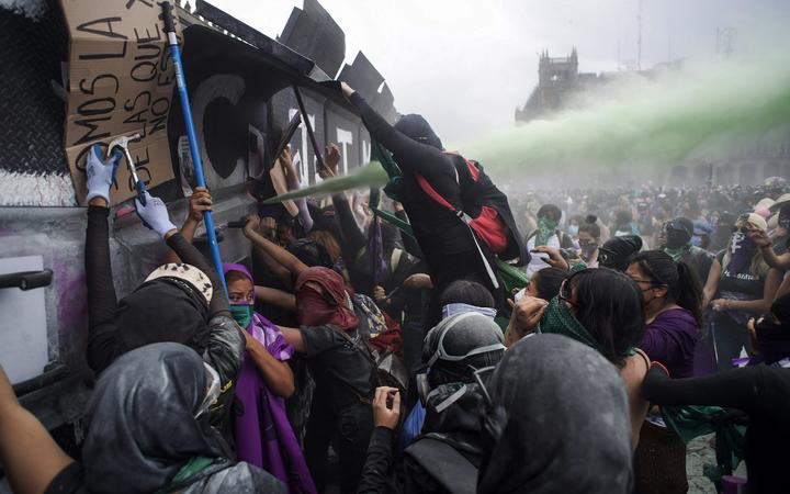 Violent clashes as women protest against femicide in Mexico City