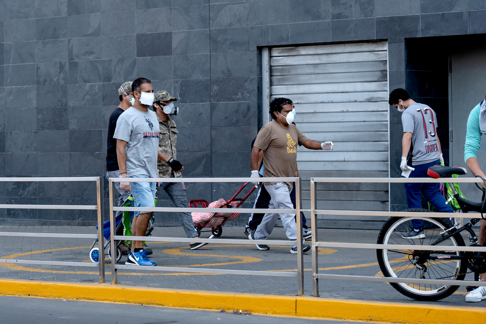 Lima,,Peru,-,April,8,2020:,Men,Standing,In,The
