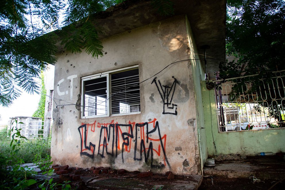 LNFM (La Nueva Familia Michoacan) written on the facade of a building in the community of Aguililla, Michoacán. (Photo Internet Reproduction)