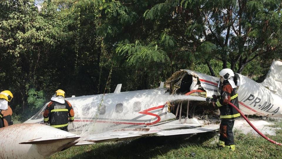 The Fire Department is working on getting the pilots out of the cabin, trapped in the wreckage. The third victim had only minor injuries.