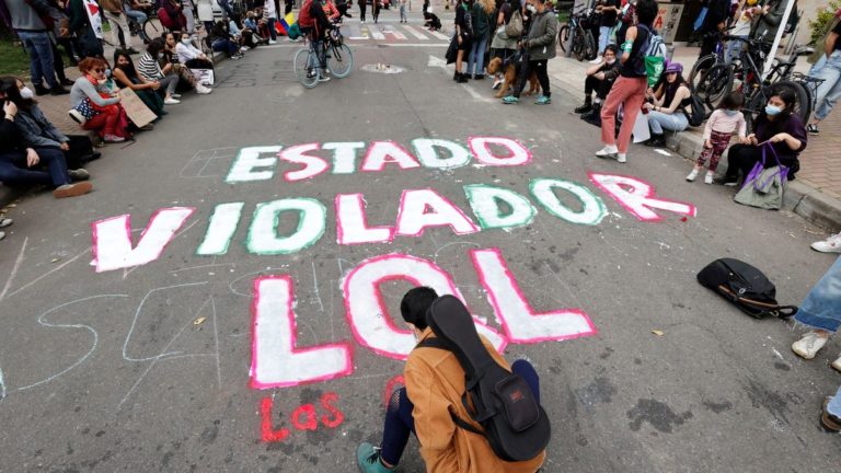 Demonstrators in Colombia point fingers at police for sexual violence