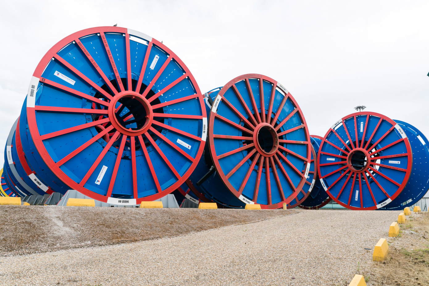 Large reels used to carry subsea telecom cable at Le Trait, northern France