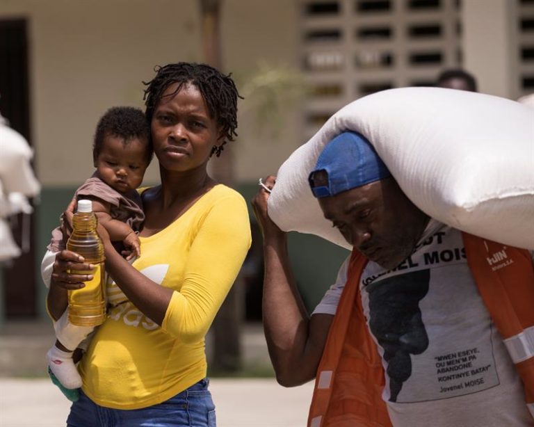 Hunger causes unrest during food distribution after earthquake in Haiti