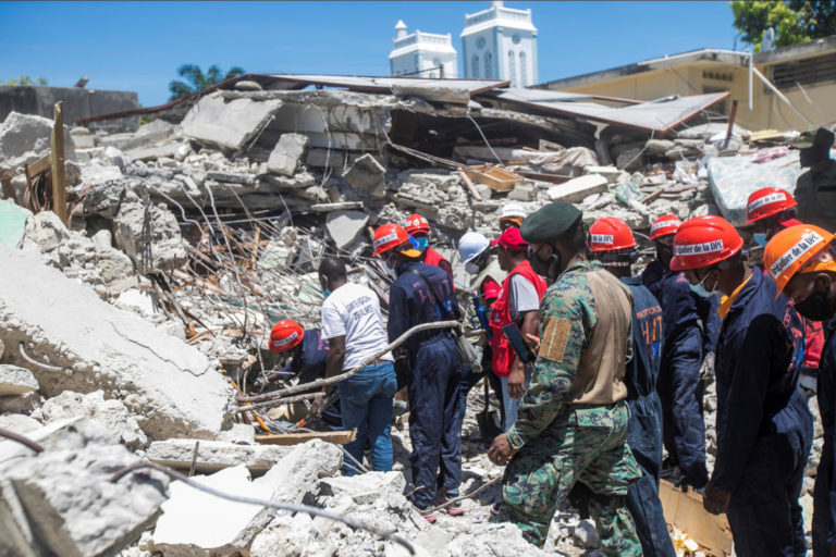 Haiti raises death toll to at least 1,297 from earthquake (Update 2)