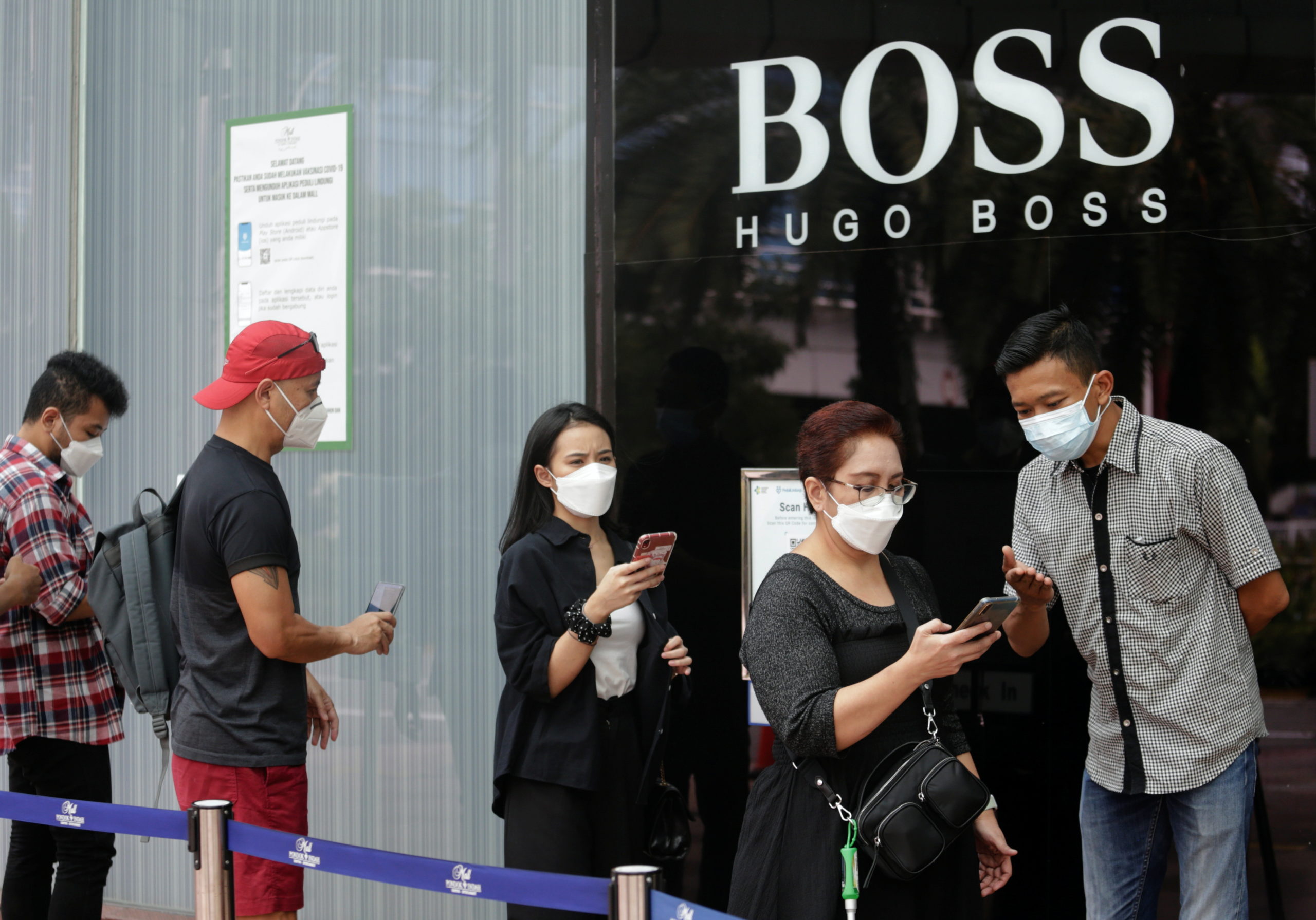 Indonesian capital requires shoppers to show vaccination proof before entering malls