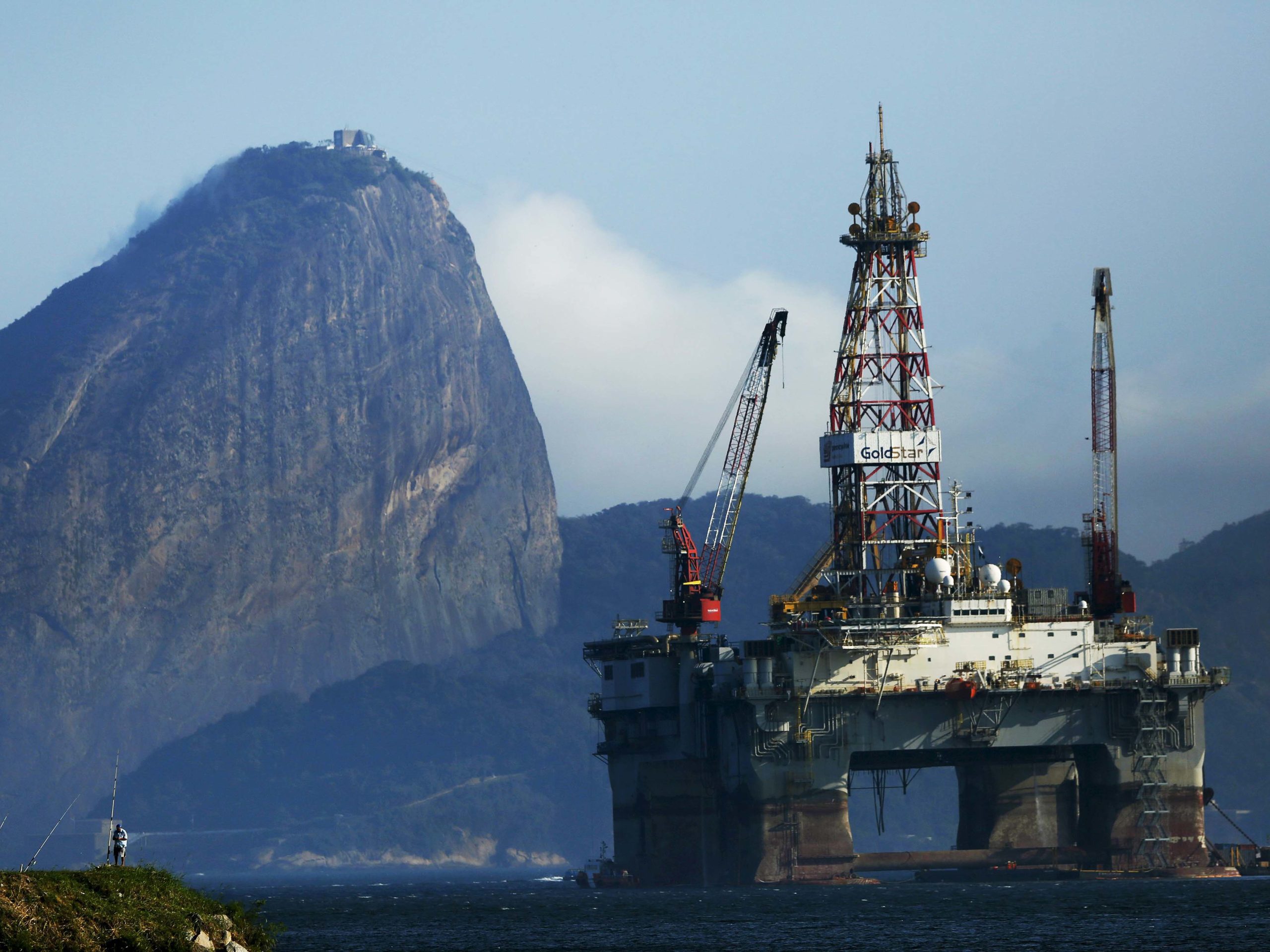 Oil Now Competes With Soy And Iron Ore as Brazil's Top Export- An oil platform is pictured in Guanabara Bay with the Sugar Loaf Mountain in the background in Niteroi, near Rio de Janeiro. (Photo Internet reproduction