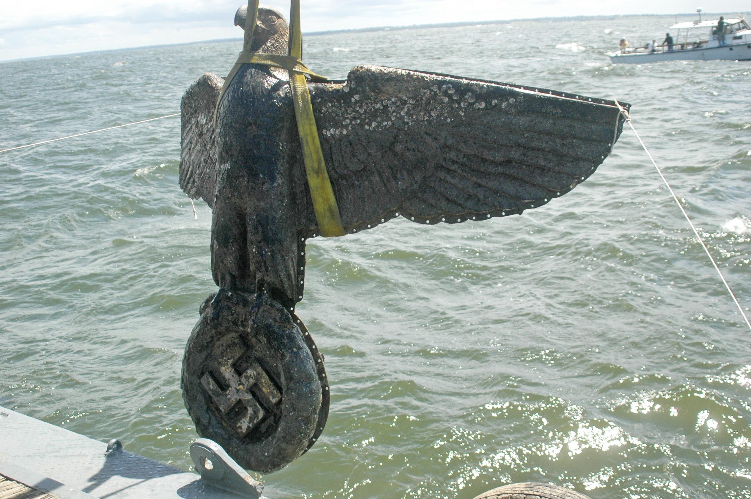 The Etchegarays intend to sell, mainly, the ship's rangefinder and its bow mask, an eagle - a traditional German symbol - holding a swastika, which has become a source of international controversy.