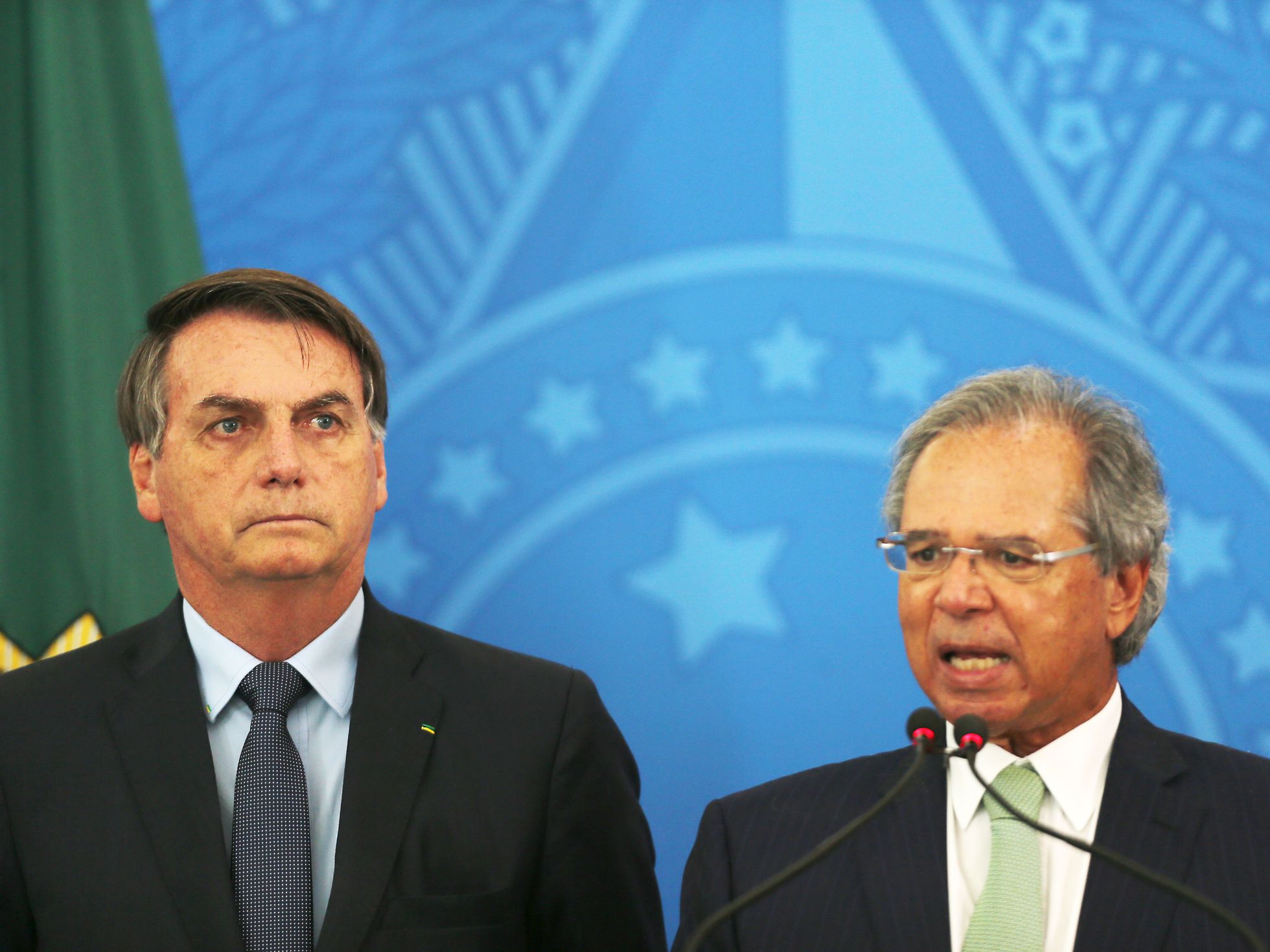Brazilian President Jair Bolsonaro (left) and Brazilian Economy Minister Paulo Guedes (right).