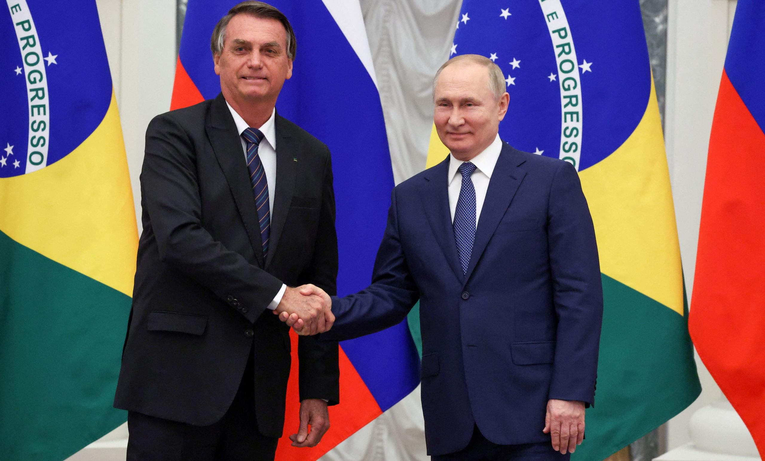 Russian President Putin and his Brazilian counterpart Bolsonaro attend a news conference in Moscow