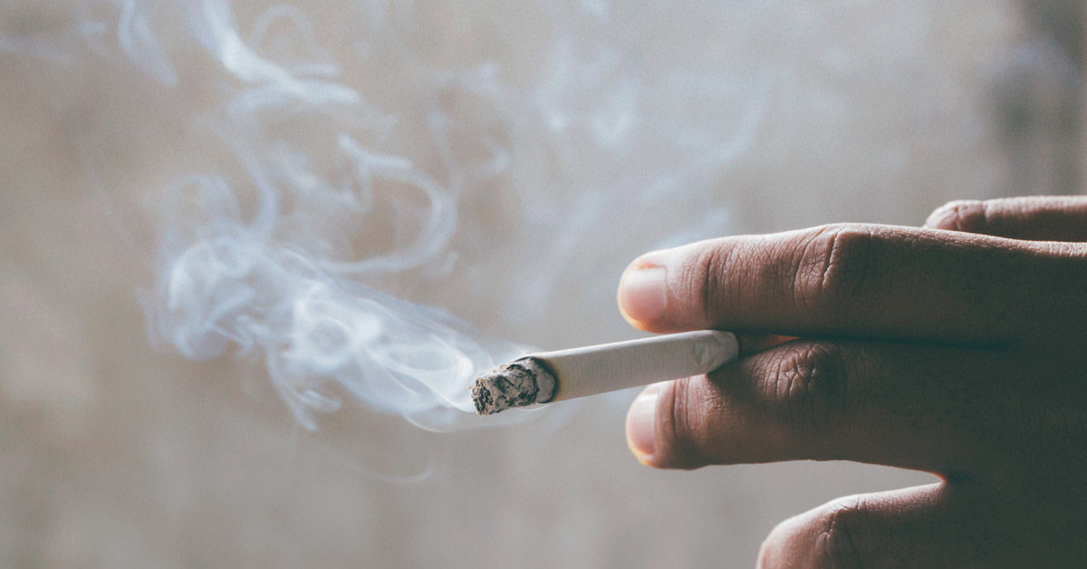 smoking Cigarettes tobacco in hand with a soft-focus. concept quit Cigarettes are dangerous to health.
