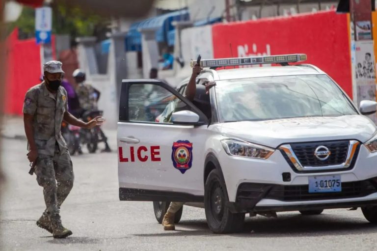 Haitian Police ban carrying weapons and say it will not tolerate violence