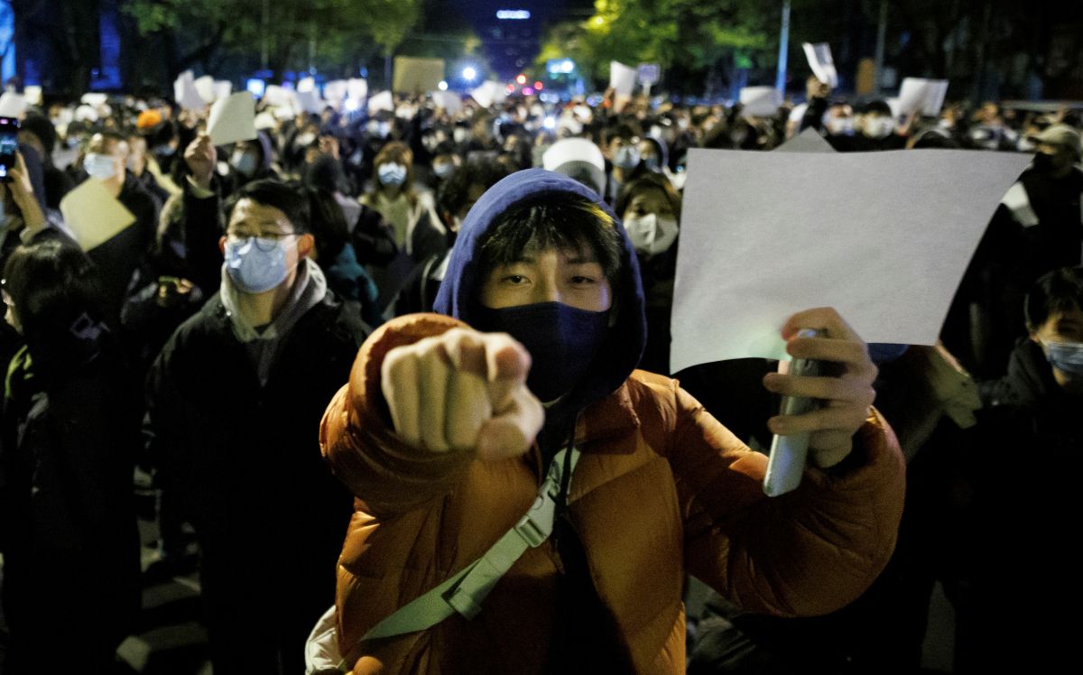 Vigil commemorating victims of a fire in Urumqi, in Beijing