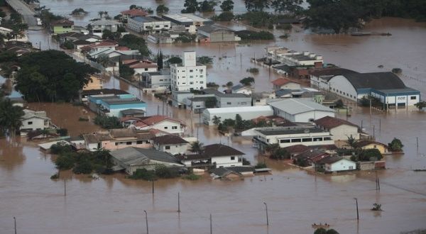 At least two dead and one firefighter missing in floods in southern Brazil