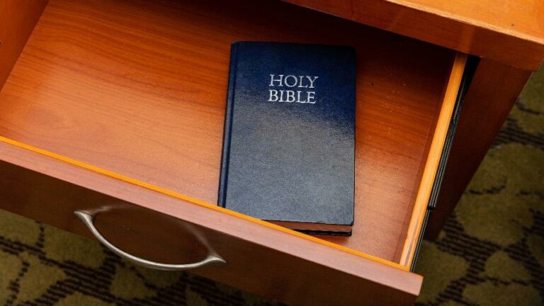 What is the origin of the bibles left in hotel drawers around the world?