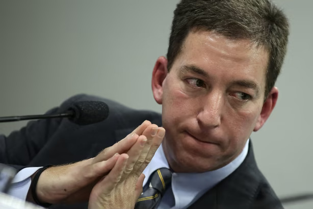 Award winning American journalist Glenn Greenwald in the sights of bigots in an increasingly tyrannical Brazil