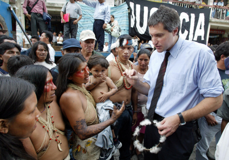 Steven Donziger with Ecuadorian native clients on first day of trial against Chevron in 2011.