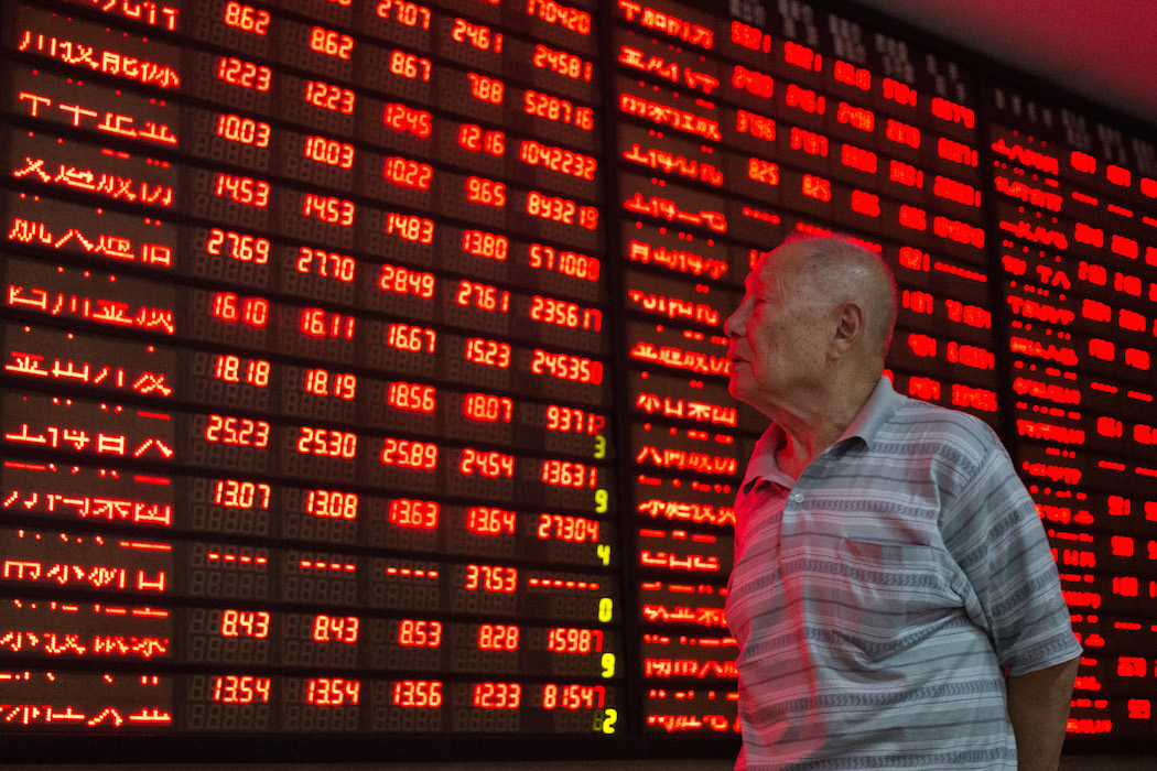China's stocks reverse declines as traders weigh state support