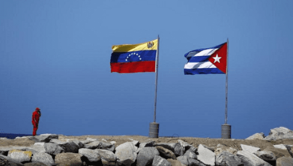 Venezuela and Cuba’s ruling parties ink collaboration agreement