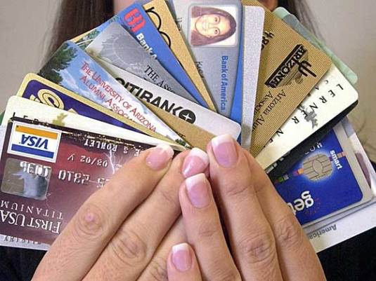 holding-a-basket-of-credit-cards