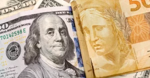 Dollar Closes Lower at R$ 4.97 After Touching R$ 5