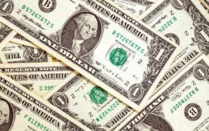 U.S. Economic Data Triggers Dollar Slide, Fed Rate Cut Speculation Grows