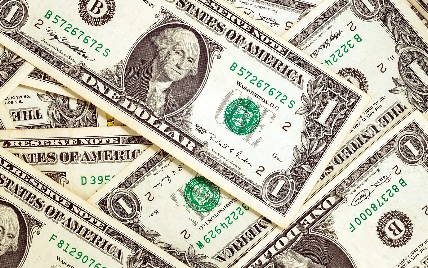 U.S. Economic Data Triggers Dollar Slide, Fed Rate Cut Speculation Grows