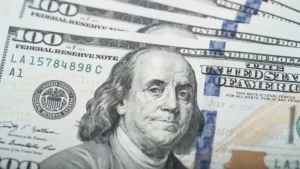 Dollar Falls 1% Amid Market Adjustments Despite Weekly Gain