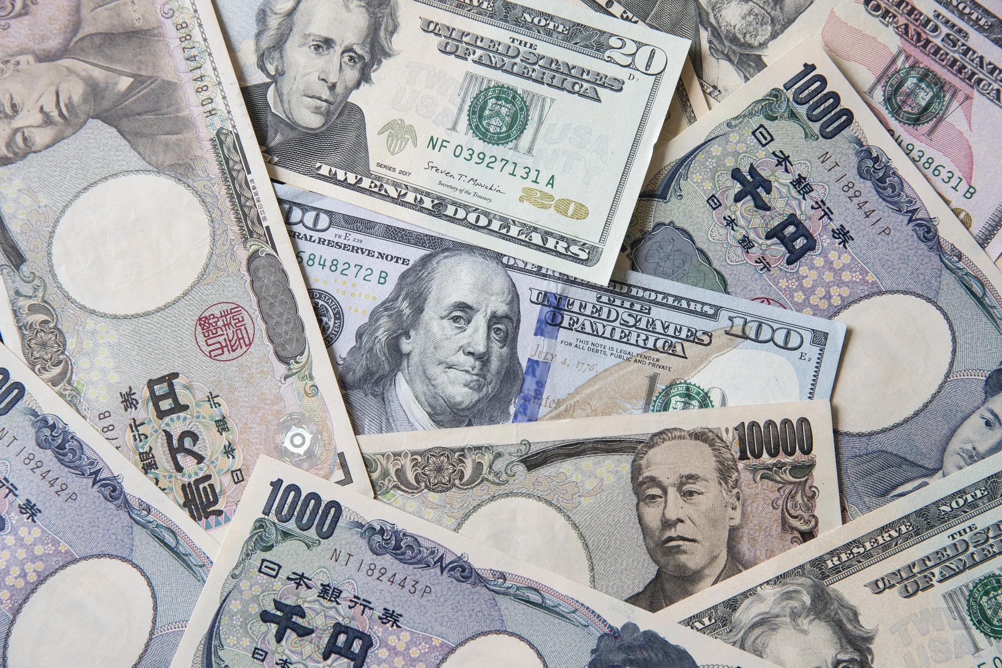 Yen Surges to 155 Against Dollar Amid Global Tensions and Economic Moves