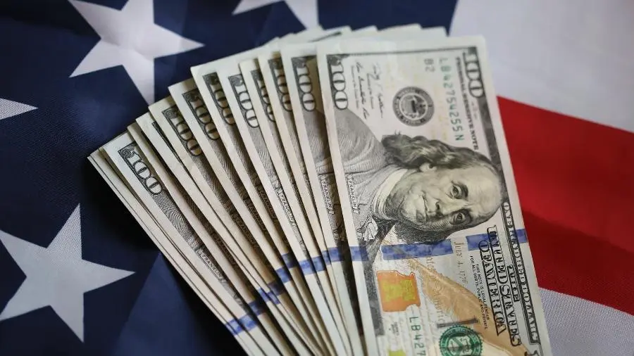 Economic Trends and Powell's Comments Drive Dollar Down