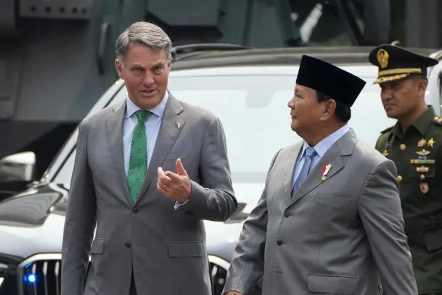 Indonesia’s Defence Minister Prabowo Subianto (left) receives his Australian counterpart Richard Marles