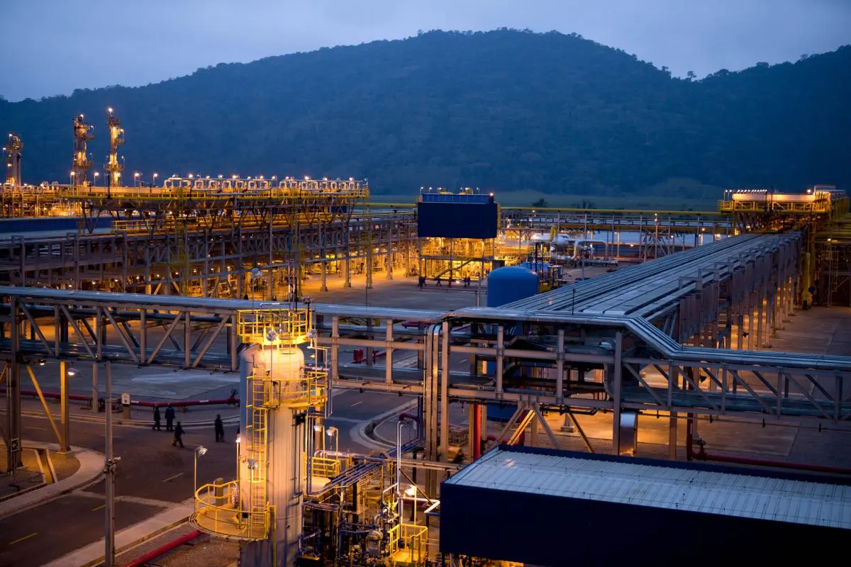 A natural gas processing plant at dusk.