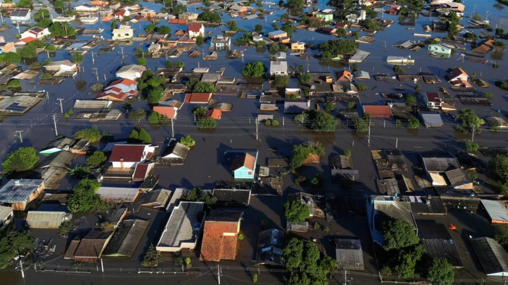 Aerial view of a flooded residential area with many houses