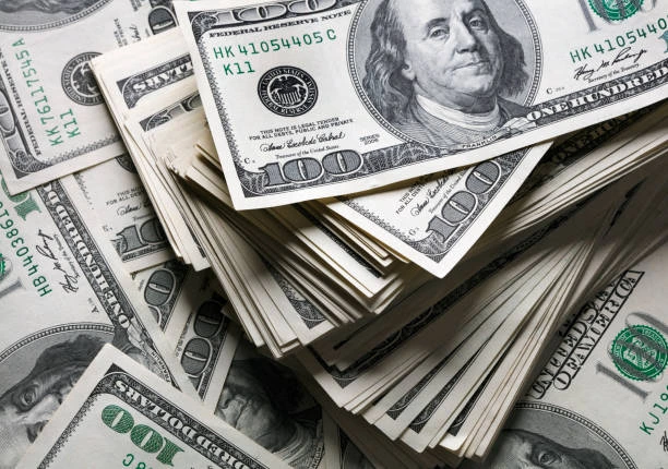 Dollar Eases Slightly After Day of Market Fluctuations