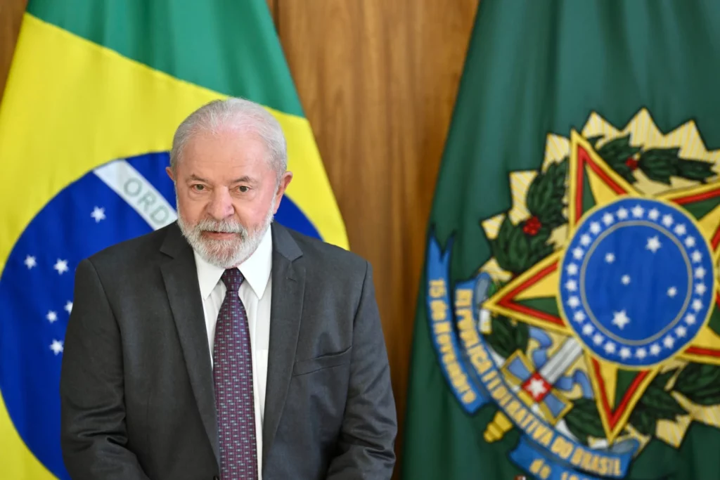Man in suit with Brazilian flags